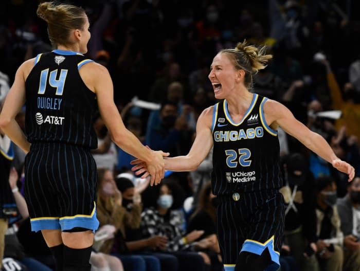Allie Quigley high-fives Courtney Vandersloot
